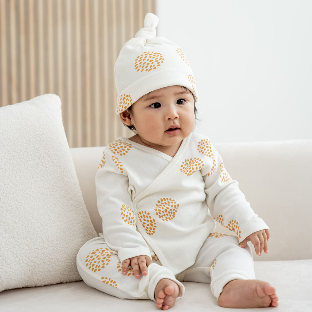 Motherswork x Le Petit Society Baby Organic Knotted Hat in Dandelion Print