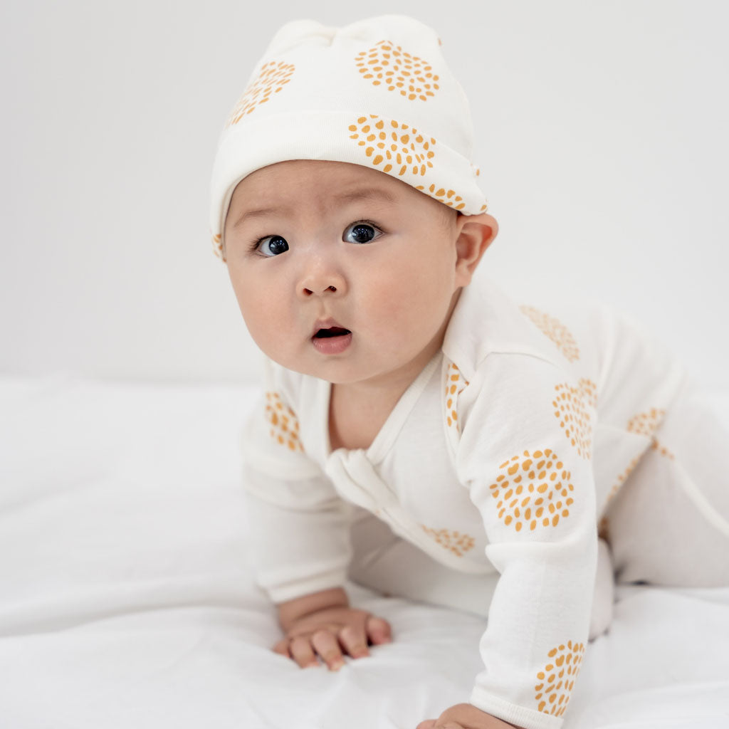 Motherswork x Le Petit Society Baby Organic Knotted Hat in Dandelion Print