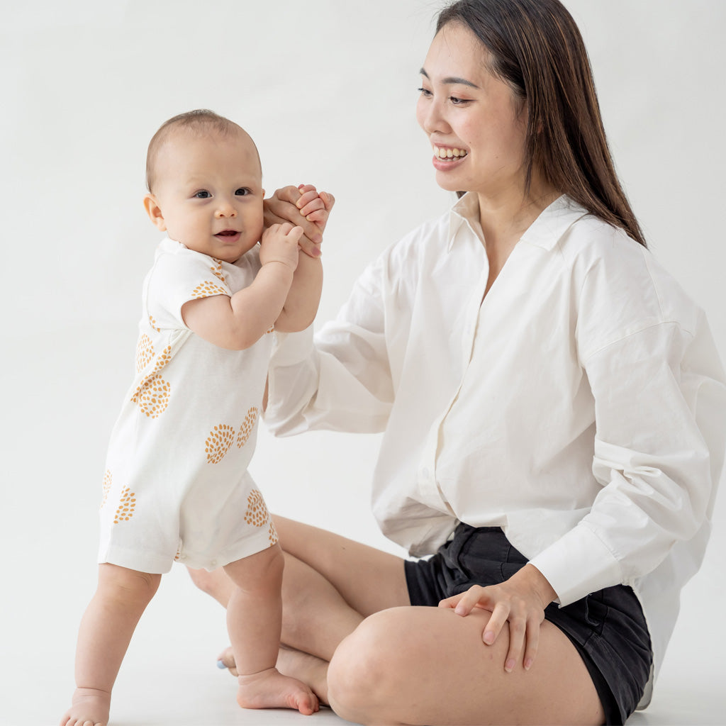 Motherswork x Le Petit Society Baby Organic Short Sleeve Romper in Dandelion Print