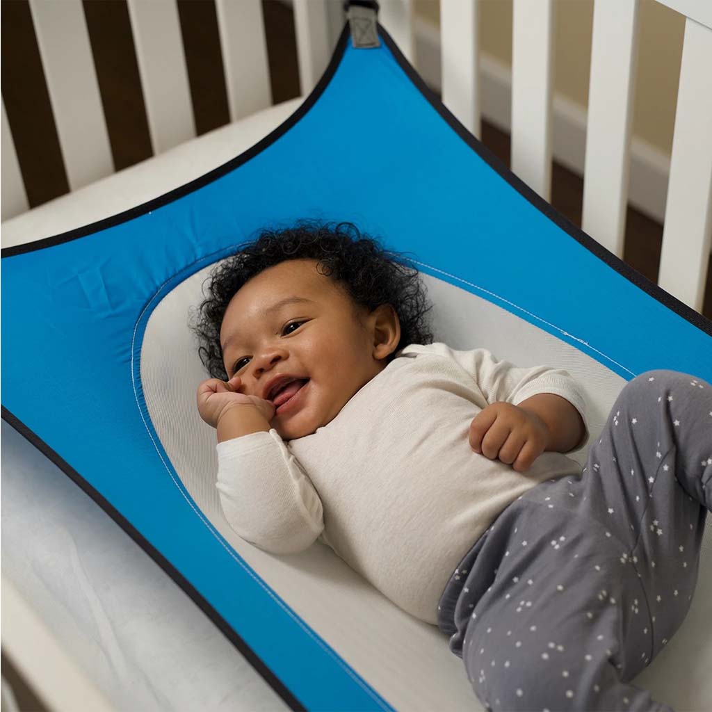 Crescent Womb™ The first + only Infant Safety Bed