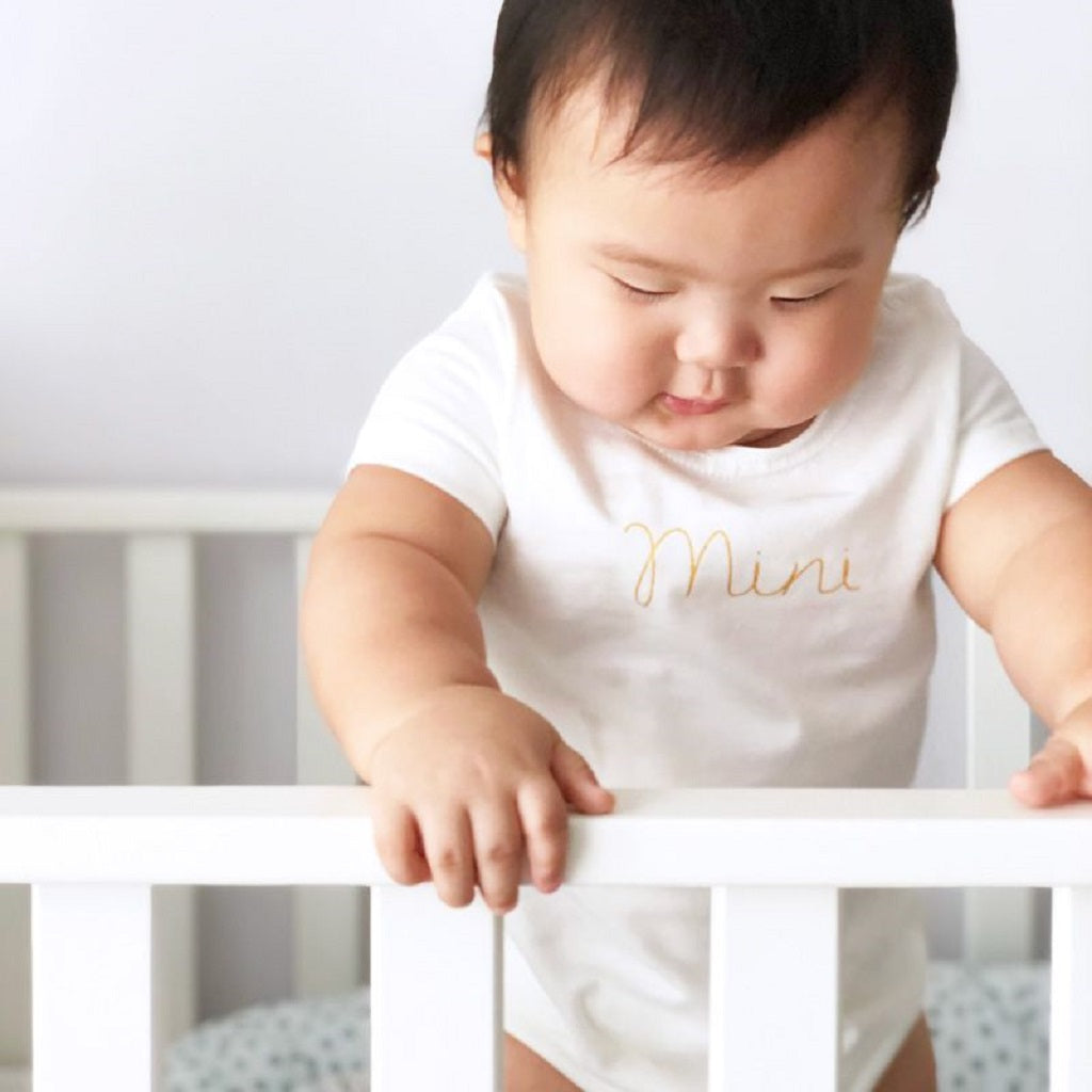 Le Petit Society Mini Short Sleeves Romper in White/Gold